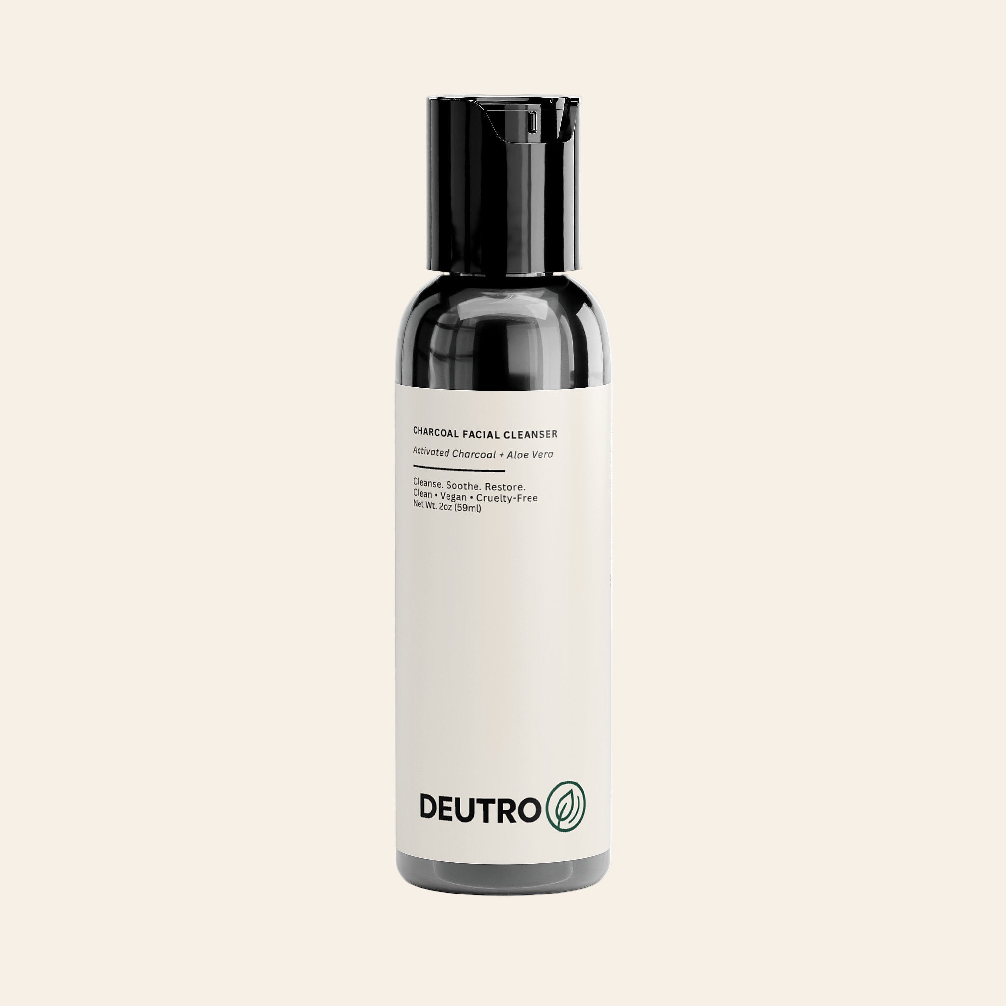 Deutro charcoal facial cleanser bottle on a beige background